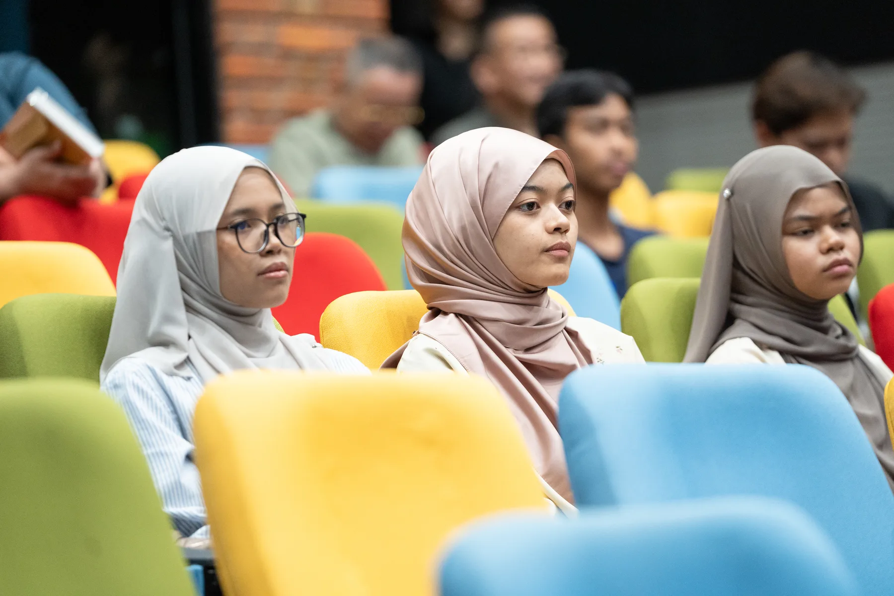 University students seated together during the dialogue