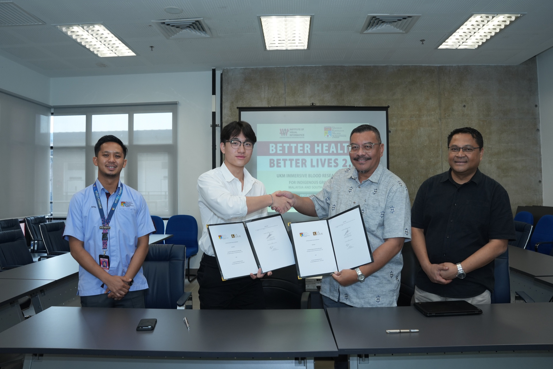 BHBL and UKM representatives at the memorandum of understanding signing
